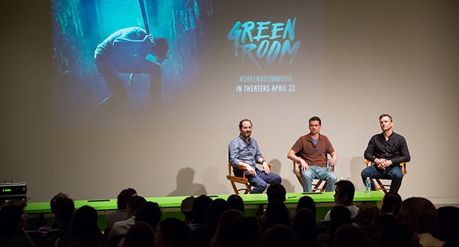 Associate professor of cinema studies Michael Aronson, Green Room director Jeremy Saulnier, and Green Room producer Neil Kopp address UO students