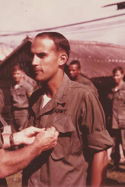 Karl Broom receiving an award for his service in Vietnam