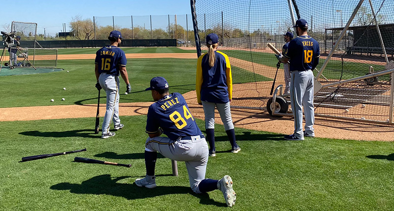 Sara Goodrum overseeing Milwakee Brewers hitters during spring training