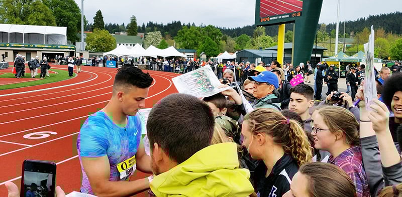 Devon Allen signing autographs