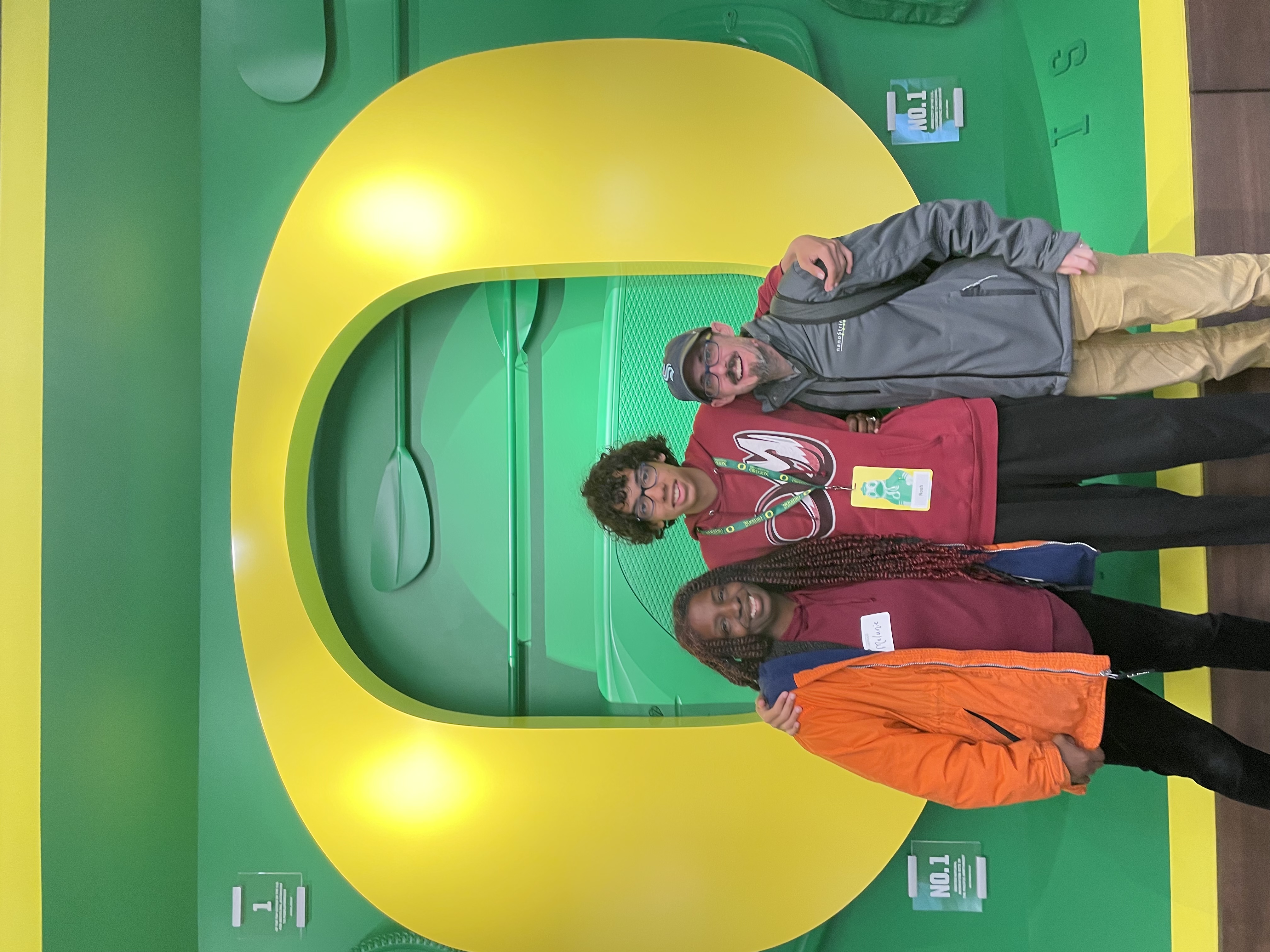 Bates family in front of an Oregon O