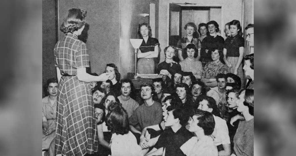 A group of freshman women gather in Carson Hall for a meeting about dorm life - Old Oregon 1952