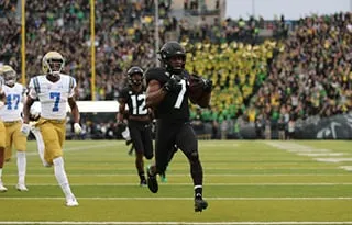 Ugo Amadi returns an INT for a TD against UCLA