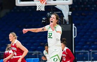 Sedona Prince celebrates scoring against South Dakota in the NCAA Tournament