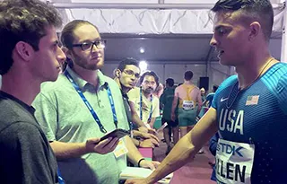 Nate Mann (left) and Alex Castle interview former Duck football and track star Devon Allen