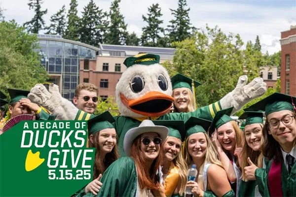 A Decade of Ducks Give, May 15, 2025.Pictured is the Duck posing with graduating students.