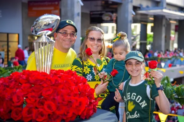 A Oregon Ducks family with the Rose Bowl Game Leishman Trophy