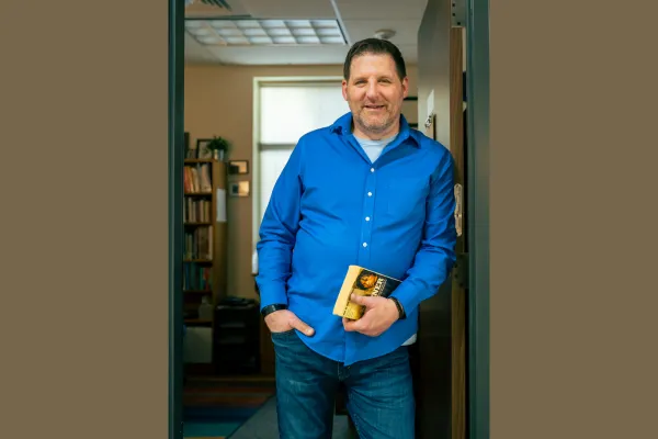 Picture of Will Fleming standing in a doorway