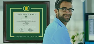 Man in front of Church Hill Classics diploma frame