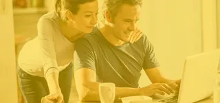 Couple looking at computer