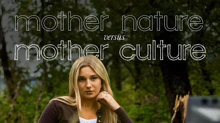 A young blonde woman in a brown cardigan poses with her head resting on her hand in front of green trees in the background. Text in white outlines says mother nature versus mother culture.