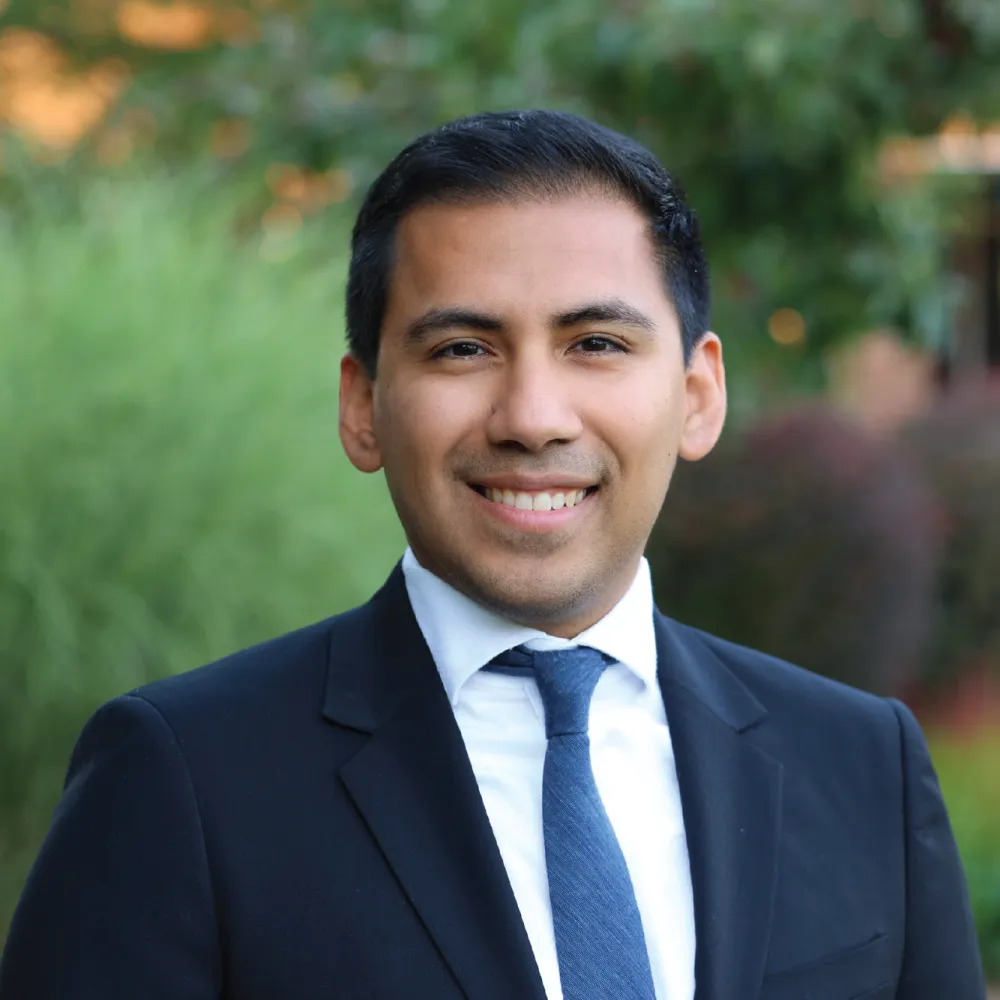 A headshot of Hector Castro