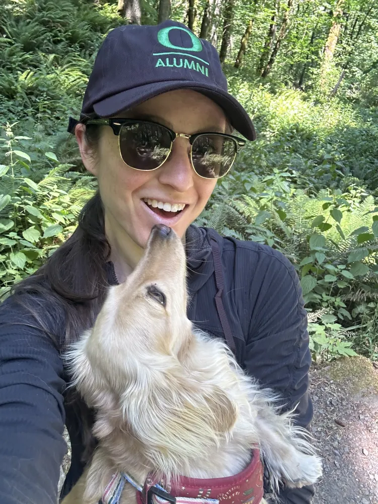 Izzy Overstreet, a UOAA staff member, and her dog