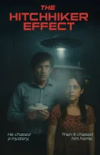 The Hitchhiker Effect movie poster with a man and a woman standing in the dark below a UFO.