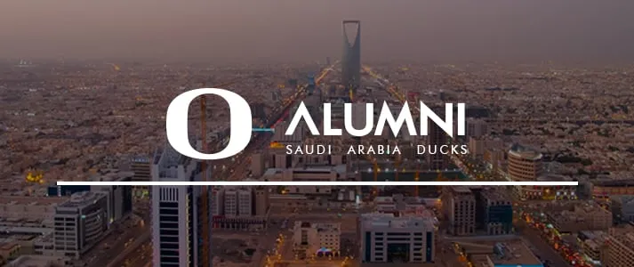 University of Oregon Alumni logo over Saudi Arabia skyline