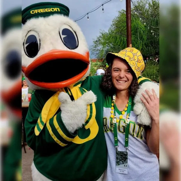 MeKenna Smith pictured with the Duck at the Arizona tailgate
