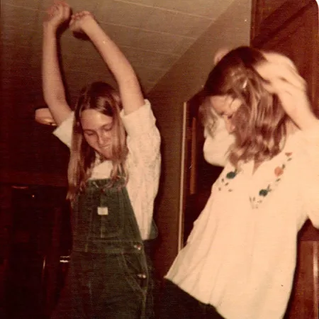 Roommates Pavel and Coon dancing in their room while a record plays.