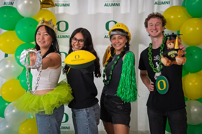 New grads pose in a photo-op at New Grad Send-Off